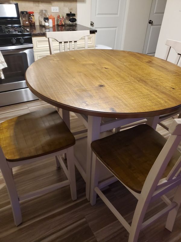Counter height round table with 4 chairs. Good condition for Sale in