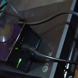 Xbox one with 1tb of space comes with power cords and controller for 150$