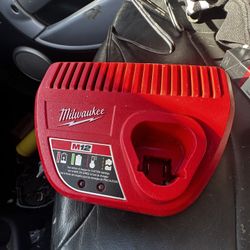 Milwaukee M2 Charger And Two Milwaukee M1 18 Batteries