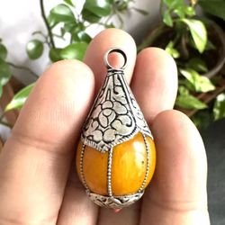 vintage and beautiful hand carved copal resin Pendant 🔥