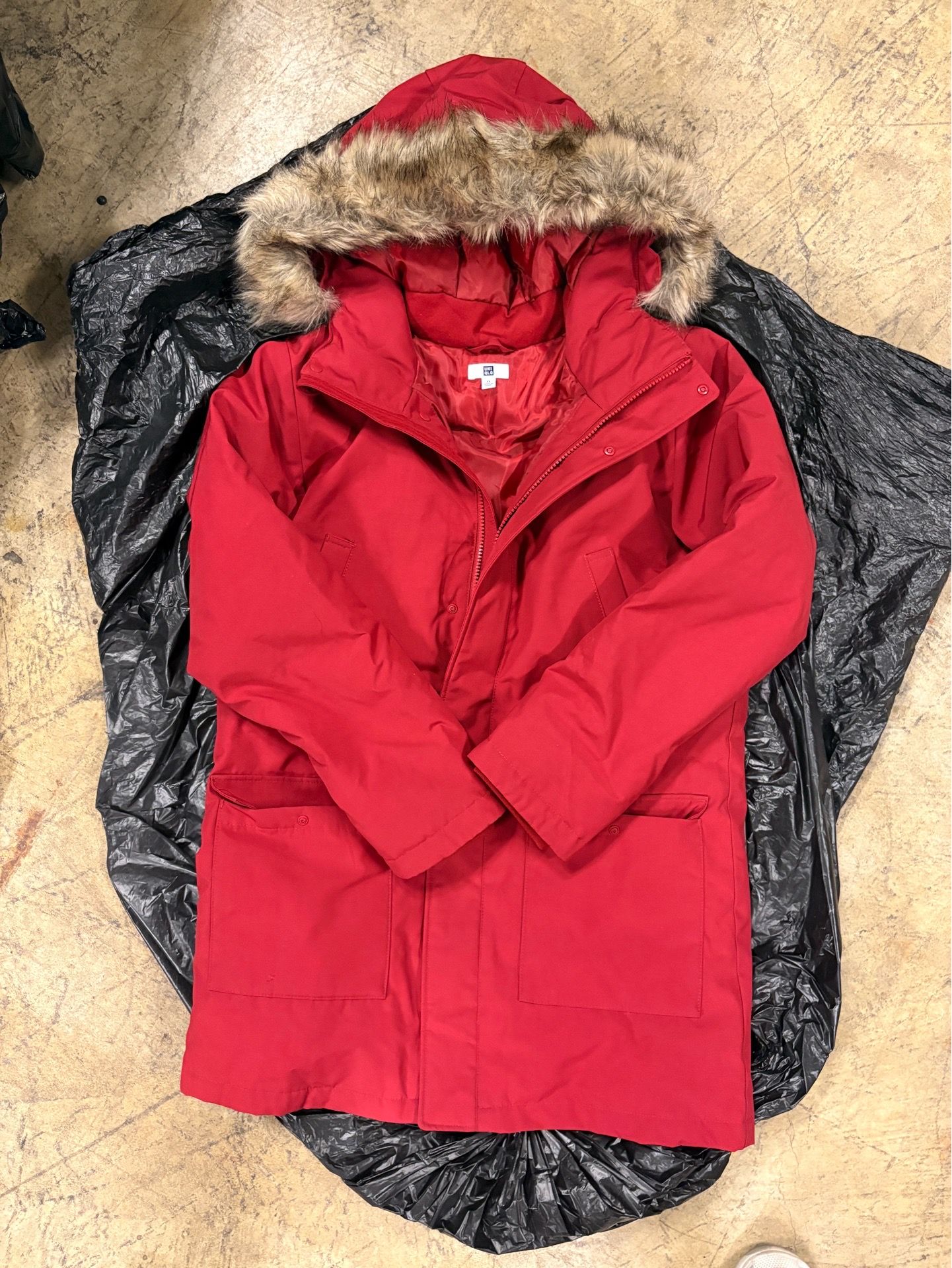 UNIQLO long parka for men and big kids.