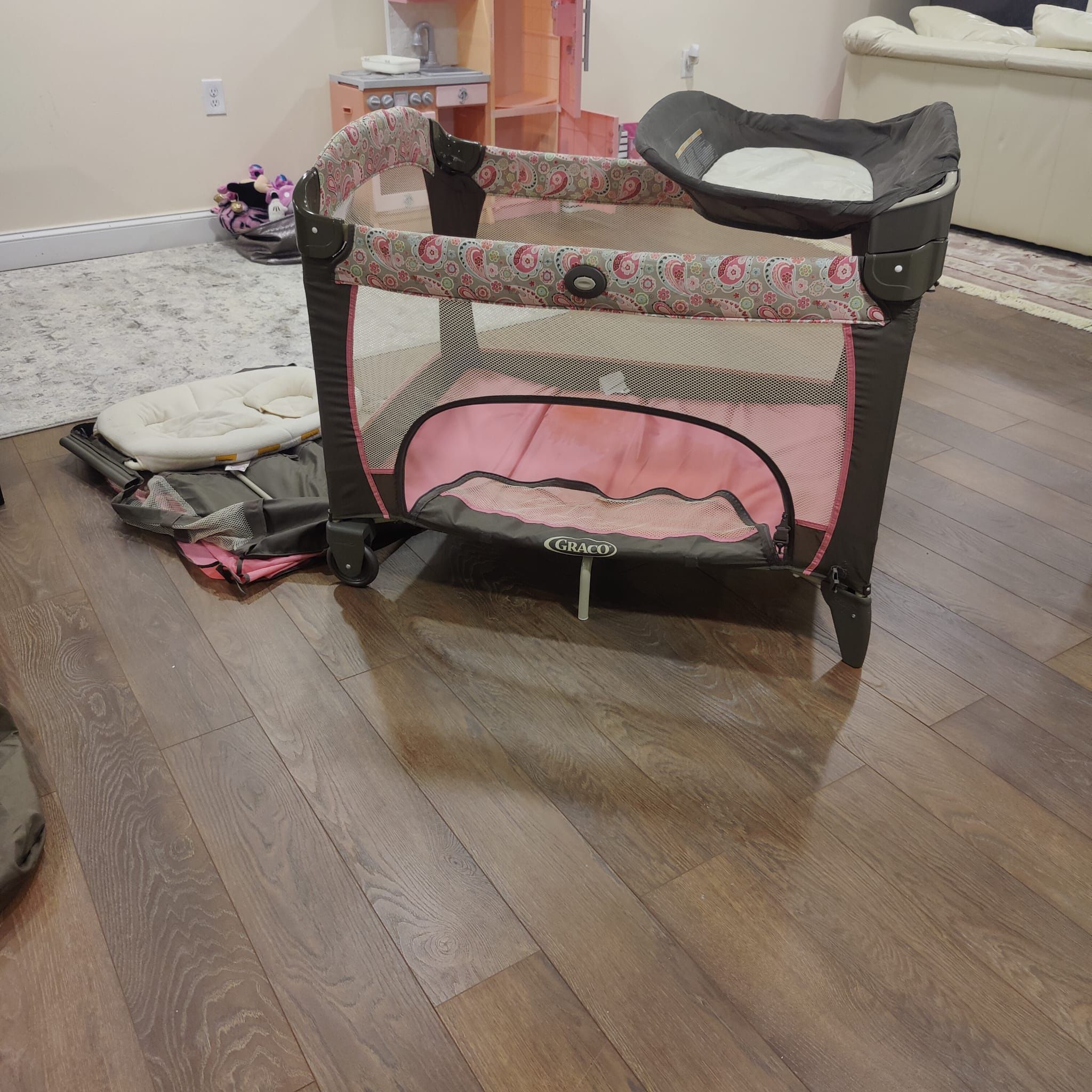 play pen and changing table