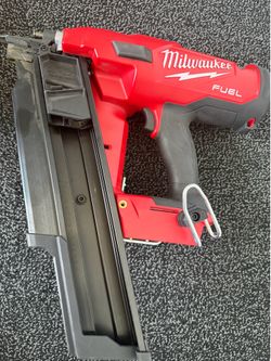 Milwaukee M18 Fuel complete drill set with batteries and Milwaukee M18 21 degree nailer