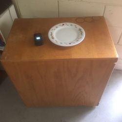 :Used Beautiful wood cabinet, on wheels: 29 ht x 18wide x 29deep, 