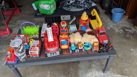 Lot of 17 kids toys fire trucks rocket ship Spider-Man motorcycle Legos animated dog