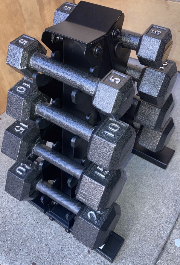 Weights 5s,10s,15s and 20s cast iron dumbbell sets with tower rack
