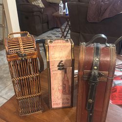 Wine bottle carriers