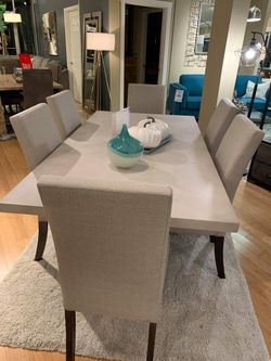 Concrete 7 piece dining set presented by modern home furniture in Everett