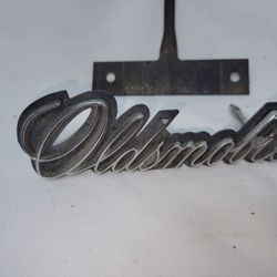 VINTAGE OLDSMOBILE 4PC EMBLEM 