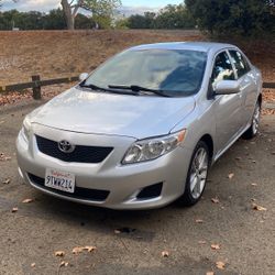 2009 Toyota Corolla LE four-door sedan runs excellent automatic 56,000 mileage