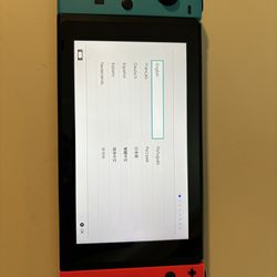 Very Nice Red And Blue Nintendo Switch With Extras