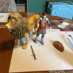 The Chronicles of Narnia Prince Peter Pevensie 5” with shield and sword and Aslan the Lion (tip of tail missing but difficult to tell From Disney All 