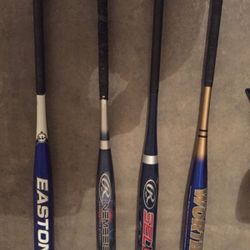 Baseball bats with bag and accessories.