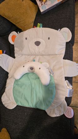 Bright Starts Tummy Time Prop & Play Mat in a polar bear design.