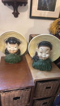 Mid century Asian heads