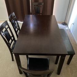Dining table with 4 chairs and bench