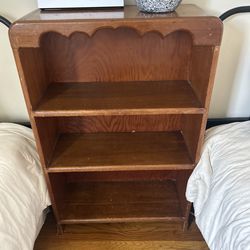 Solid wood bookcase with stickers on side