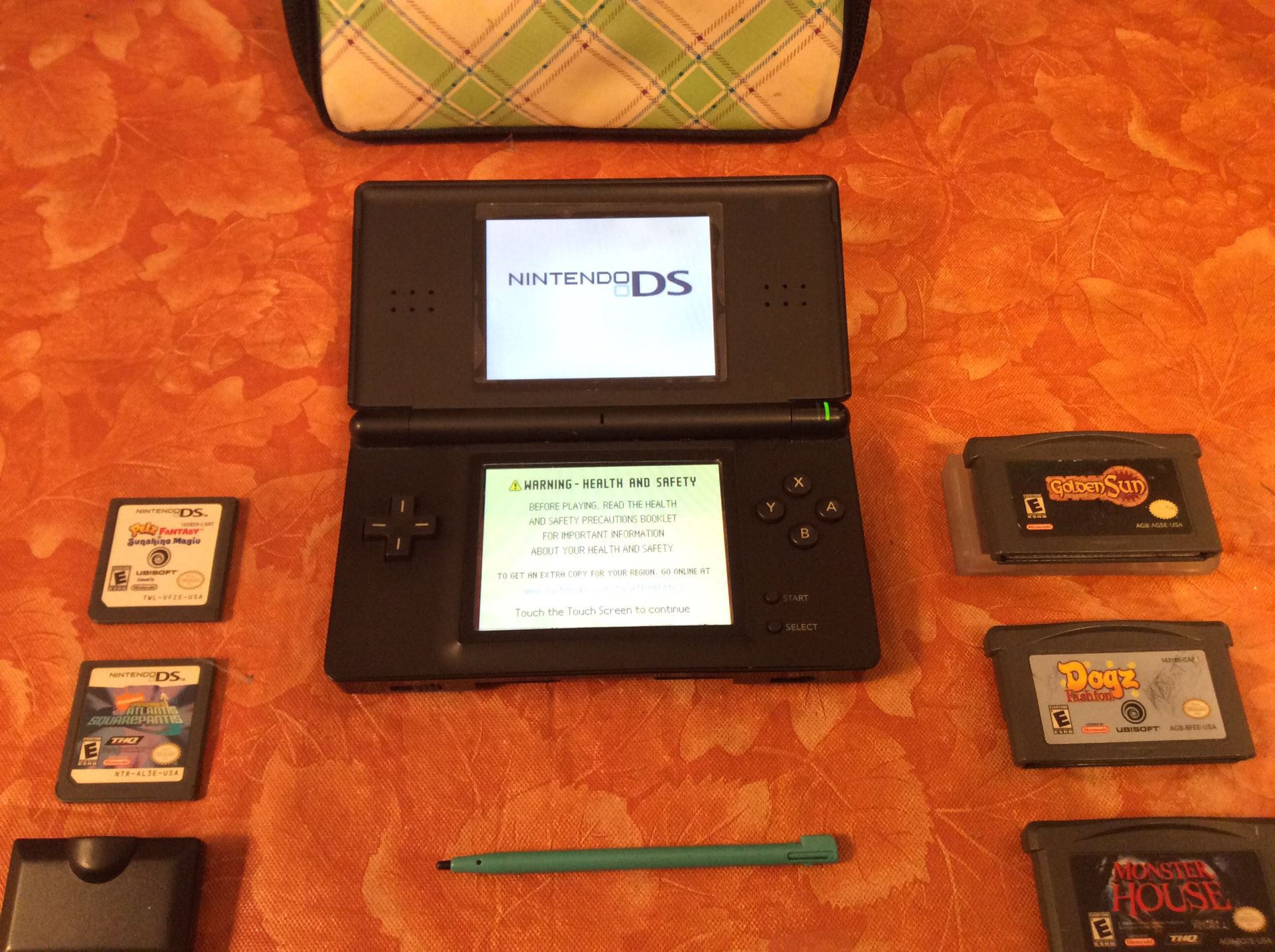 Nintendo DS Lite w/. Charger - 5 Games - Stylist - Screen Protectors and Official Case $60 Or Best Offer