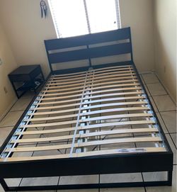 Queen size bed frame with mattress and box spring