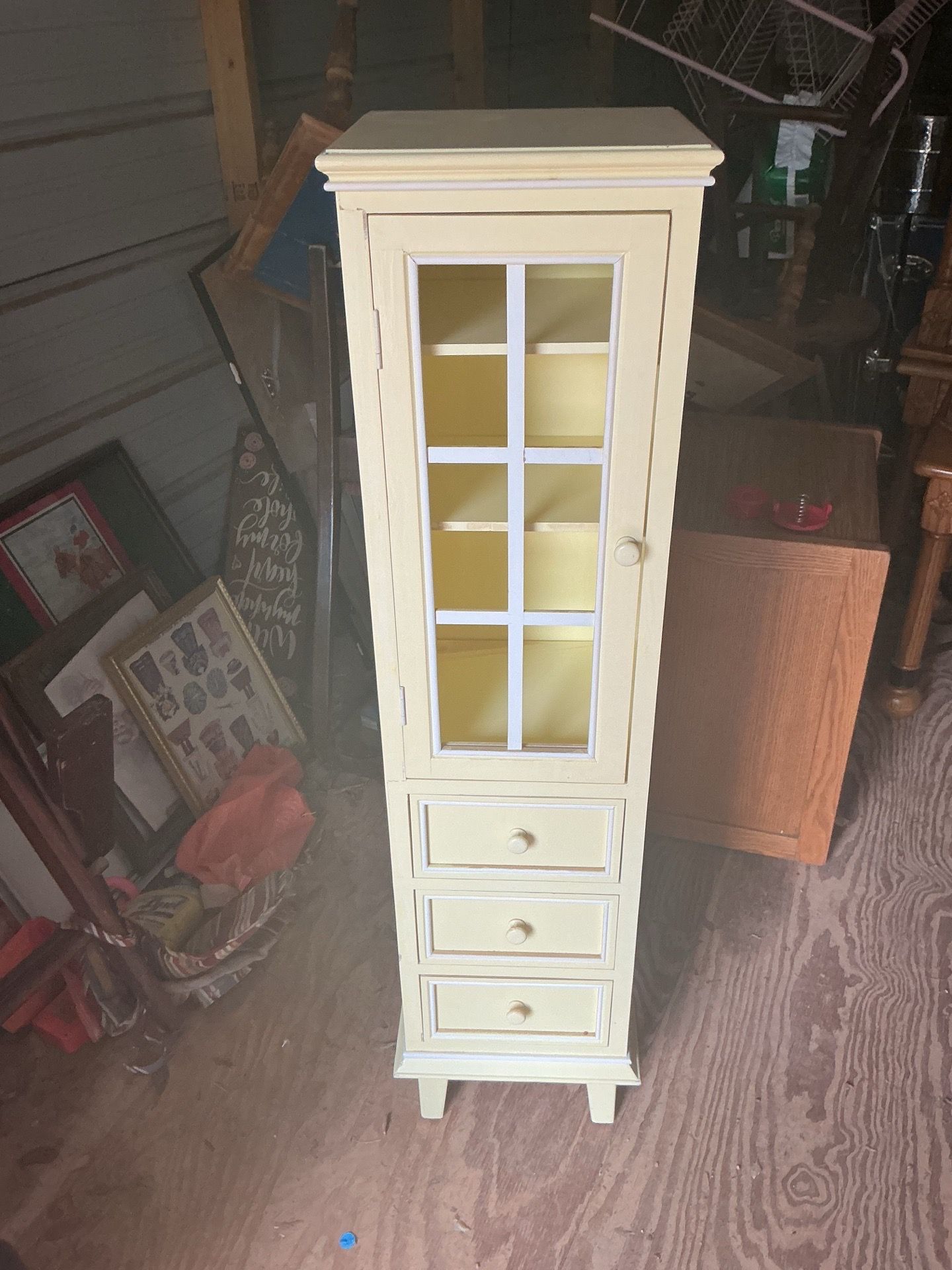 Cute cabinet it’s 46 inches tall and 12 by 10 inches