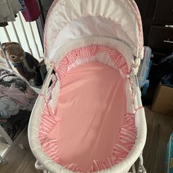 A Lot Of Baby Things Swing, Bassinet, Rocker and Lots Of Clothing 
