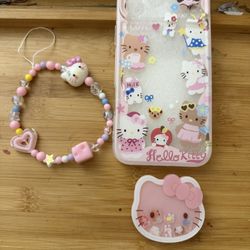 HELLO KITTY IPHONE 17 PROMAX COVER ALONG WITH KITTY HOLDER AND ACCESSORY