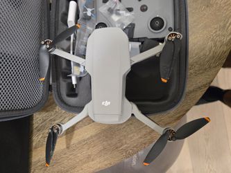 DJI Mini 2 Drone Bundle — Controller, Case, 2x 64GB SD Cards + Reader
