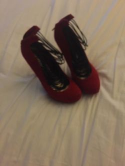 Red pumps size 8