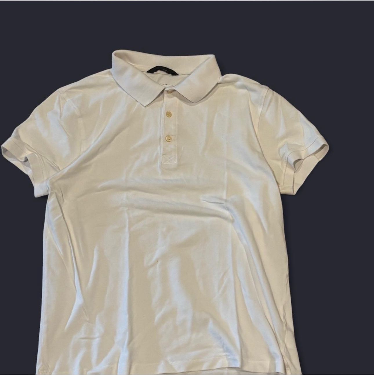 White collared H&M polo shirt