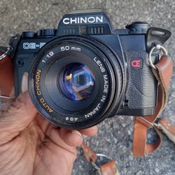 Chinon CE-5 35mm Film SLR w/50mm F1.9 Lens,  Padded Strap,  And New Batteries! WORKS GREAT!