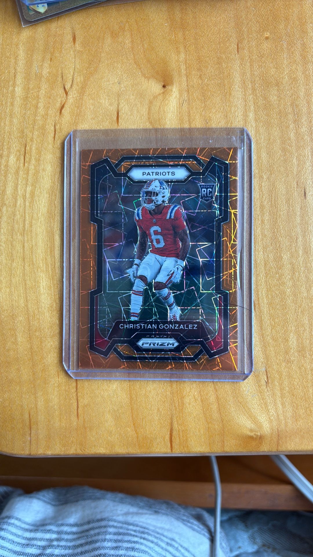 Christian Gonzalez Orange Wave Rookie Card