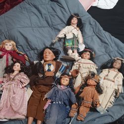 Porcelain Indian Dolls And Two Snow White