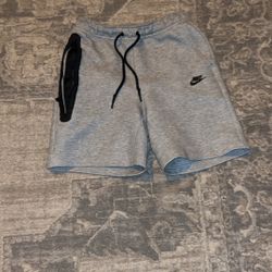 nike tech shorts size s