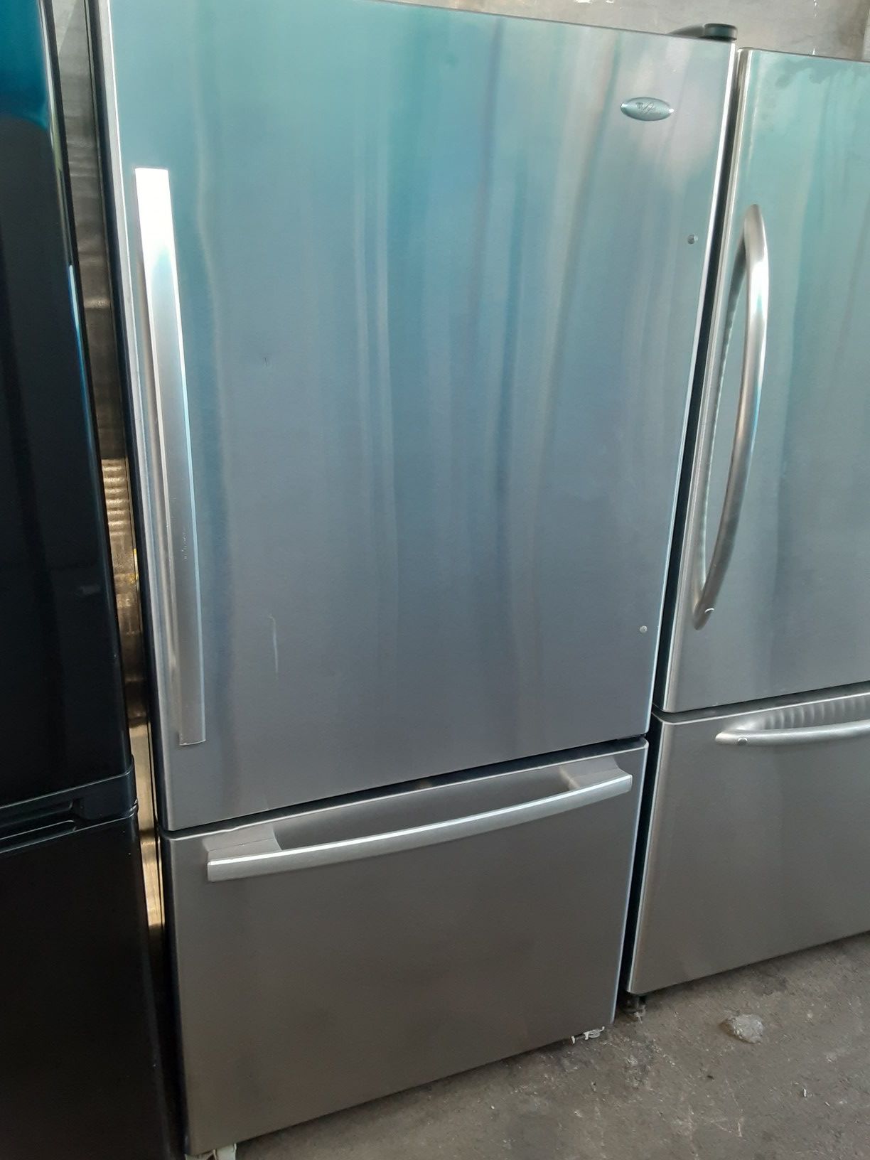$399 Whirlpool Amana stainless bottom freezer fridge 33 in wide includes delivery in the San Fernando Valley of warranty and installation