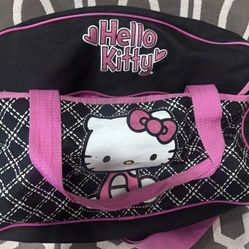Super cute Hello Kitty duffel bag in black with pink trim and quilt pattern- Small Tear 