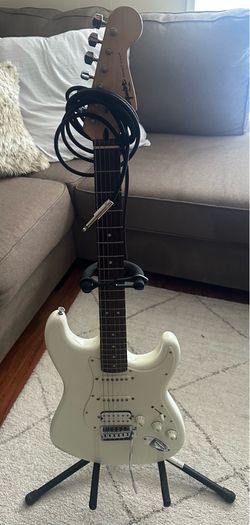 Squier Electric Guitar with SP-10 amp $100