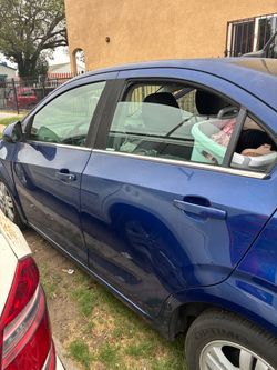 Blue Sedan with Body Damage