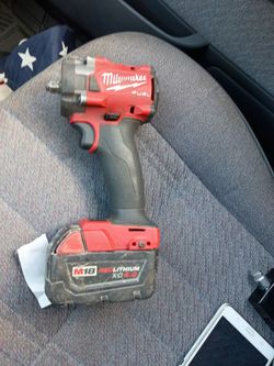 Milwauki  fuel 3/8  compact impact wrench with M18 red lithium  xc  4.0 battery