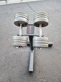 Pair of adjustable dumbbells 50lbs each
