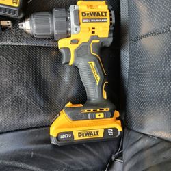 DeWalt 20V MAX Brushless Impact Driver with a 2.0 AH battery and a DCB107 charger