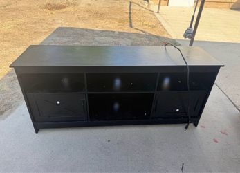 Black TV Stand with Cabinet Storage for 55, inch tv / my son don’t need it anymore I got it at Amazon