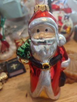 2 Christmas ornaments 1 Glass Santa 1 Fill With Puree