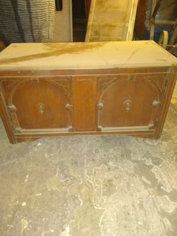 Old cabinet approximately 18 in tall by 40 inches wide by 16 in deep