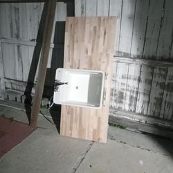 Virgin. Wood Countertop And  Deep Plastic Sink 
