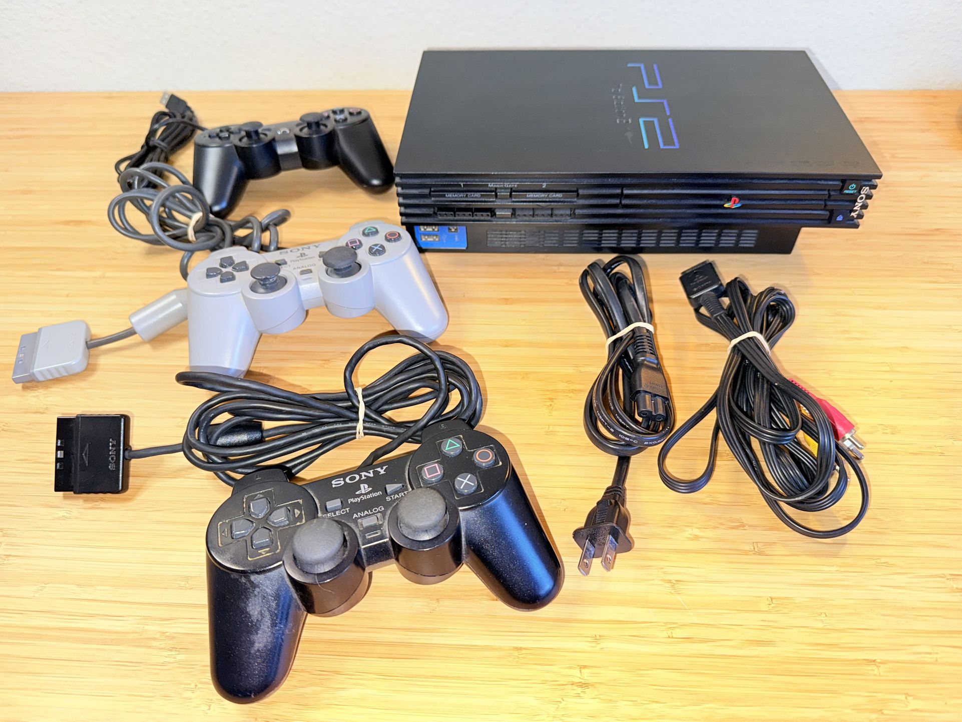 PlayStation 2 System With 3 Controllers, Cables,SCPH-30001 (Does Not Read Discs)