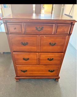 Tall wood dresser