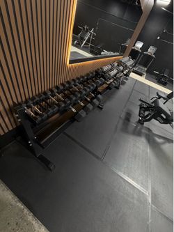 2.5-100lb DB set w racks (missing 80s) OBO
