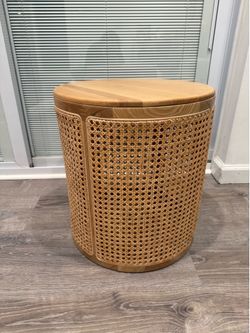 Beautiful round wooden table with woven rattan/cane detail