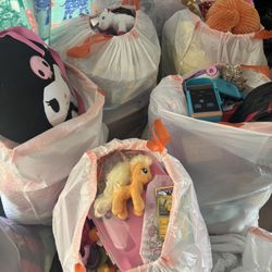 8 Bags Of Girl Toys $30