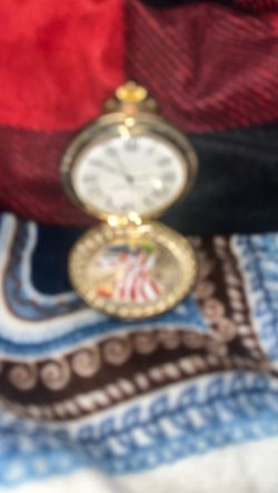 .925 1 ounce fine silver 2000 silver dollar pocket watch